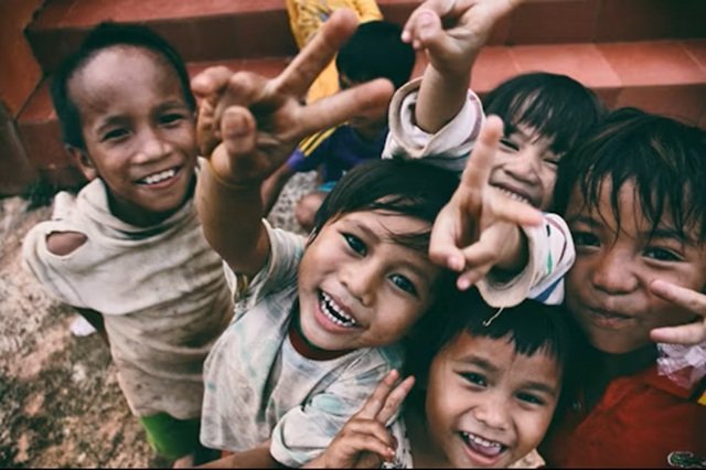 Smiling children representing local community support